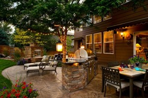 stamped concrete patio builtin fireplace and grill